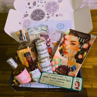 Gourmet gift set with drinks and a signed copy of the book titled 'Until the Red Leaves Fall' by Alli Barker.
