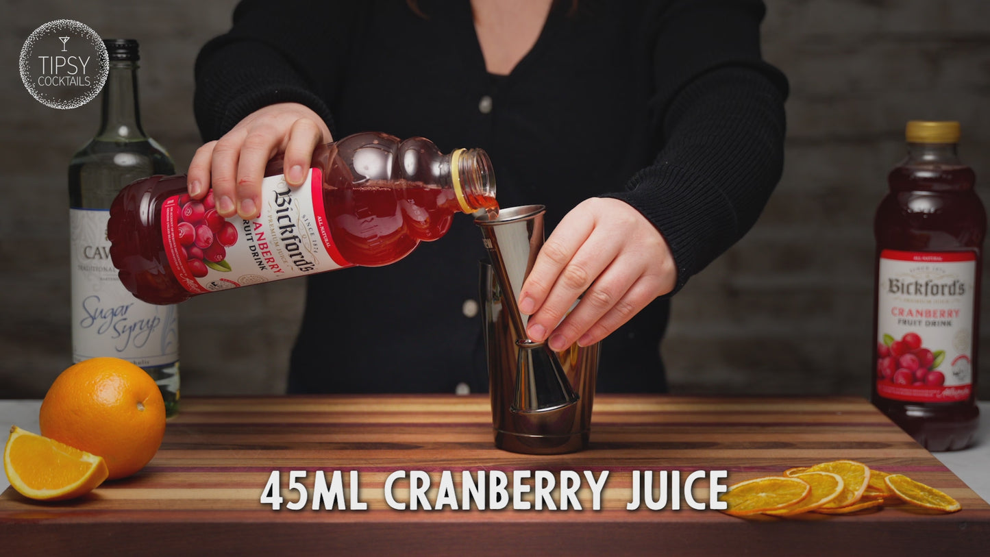 Video is of a recipe to make a virgin cosmopolitan. Starting with adding 45ml of cranberry juice to your shaker, 10ml sugar syrup, a good squeeze of orange juice and filling your shaker with ice. Shake shake shake, pour all the liquid into your martini glass and top with 60ml of soda water. Garnish with a dried orange slice and enjoy!
