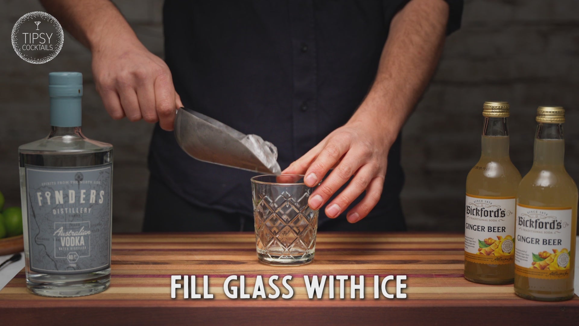 Video showing recipe for making a moscow mule cocktail. Fill your glass with ice. Add 45ml of vodka, a good squeeze of fresh lime and top with about 140ml of ginger beer. Garnish with a slice of dried lime and enjoy.