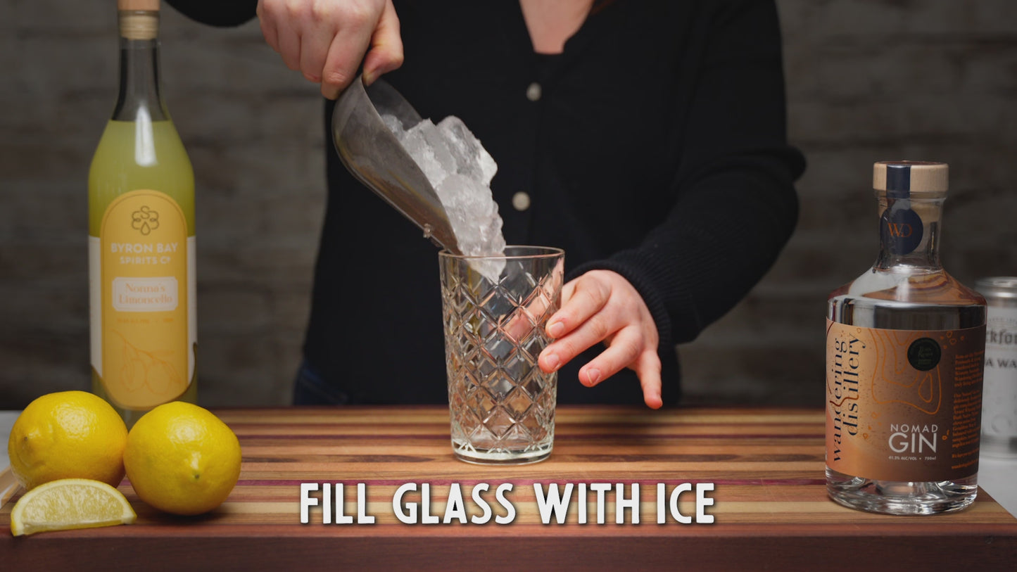 Video is of a person making the Summer Zest cocktail. Starting with filling glass with ice, pouring 45ml of gin into glass, 15ml Limoncello, top with soda water and garnish with dried lemon slice. Enjoy!